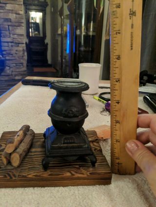 Antique Canada Forge advertising Cast iron pot belly stove coin bank 3