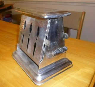 UNIVERSAL Antique Toaster Model Chrome Drop - side.  NO cord 2