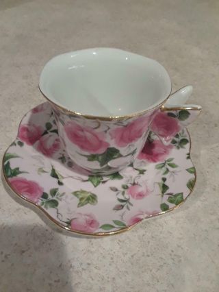 Pink Demitasse Cup And Saucer With Butterfly Handle