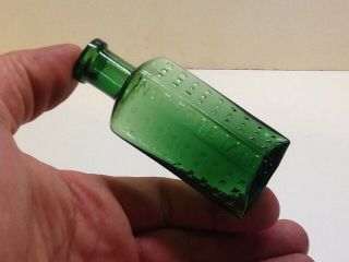 Small Antique Emerald Green 1 Oz.  Flat Back Poison Bottle.