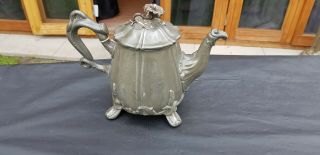 An Antique 1800.  S Silver Plated Respoused Tea Pot By Shaw & Fisher Of Sheffield.