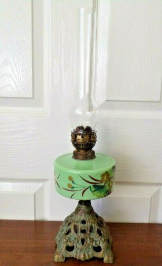 Antique Victorian Oil Lamp With Cast Iron Base Green Decorated Font