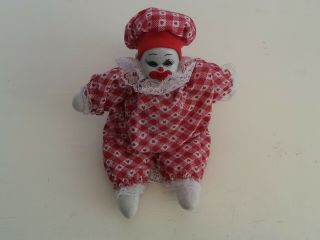 Hand Painted Porcelain Clown Doll,  Red Color,  Sand Bag Style.