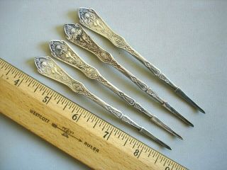 4 Vintage Reed & Barton Nut / Lobster Pick Pearl Victorian Cupid Silver Plated