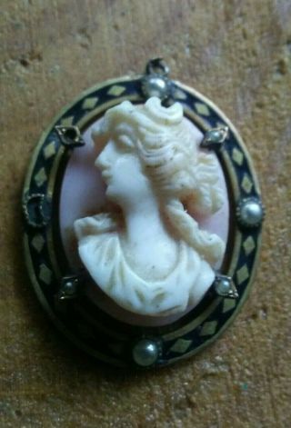 Antique Carved Stone Cameo Pendant With Black Enamel.