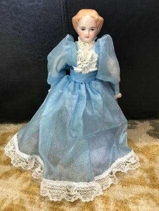 Vintage Porcelain Doll With Dress And Stand