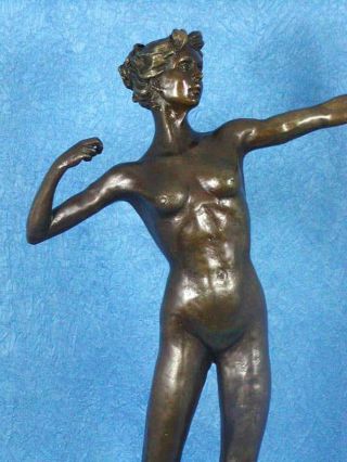 Diana with a bow statue made of bronze standing on a marble base 2