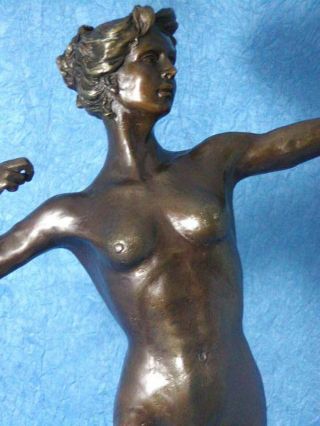 Diana with a bow statue made of bronze standing on a marble base 3