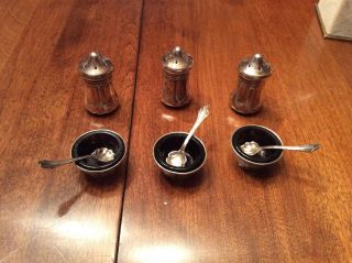Sterling Silver Salt Cellars,  Spoons,  And Pepper Shakers