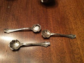 Sterling Silver Salt Cellars,  Spoons,  and Pepper Shakers 4