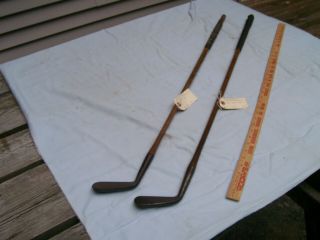 Two (2) Antique Hickory Shaft Smooth Face Mid - Iron Golf Clubs
