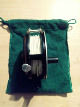 vintage ORVIS MAGNALITE FLY FISHING REEL,  British made and IV on bottom 7