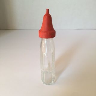 Vintage Clear Glass Doll Baby Bottle.  Embossed Dog on the Front Red Nipple 3