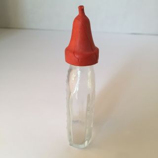 Vintage Clear Glass Doll Baby Bottle.  Embossed Dog on the Front Red Nipple 5