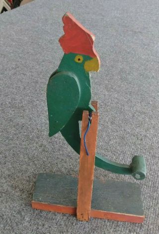 Vintage Antique Folk Art Wood Painted Parrot Swinging Rocking Toy Minor Loss