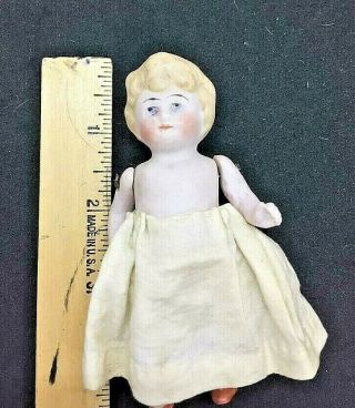 Antique All Bisque Doll Germany.  Molded Blond Hair.  Wired Arms Legs.  Cant Read