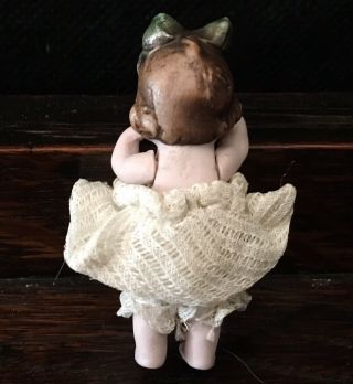 Antique Vintage Small Miniature Bisque Baby Doll - circa 2” tall - Jointed Arms 2