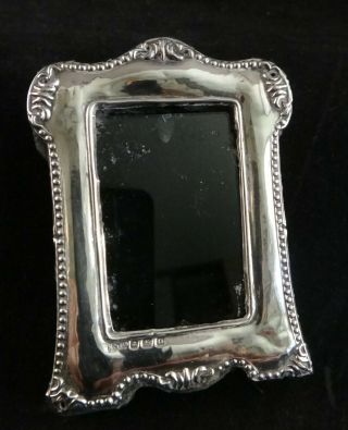 Sterling Silver Miniature Photo Frame.  Birmingham,  1938.  2 ¾” Tall,  2 “ Wide.