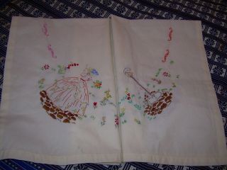 Small tablecloth with embroidered crinoline ladies.  33 