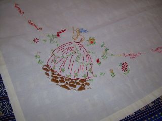 Small tablecloth with embroidered crinoline ladies.  33 