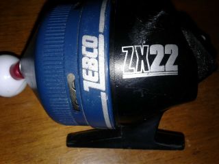 Zebco Zx22 Fishing Reel Vintage Reels Black.  /blue - About Size Of 202 - Usa Made