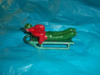 Antique Barclay Podfoot Lead Winter Figure Man Lying On Sled