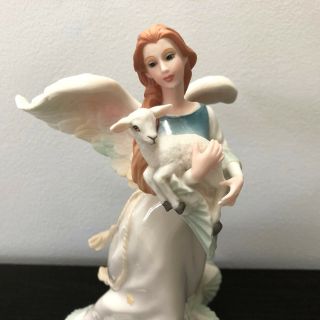 Roman Inc On Angel ' s Wings Figurine Angel of Peace with Lamb by G.  G.  Santiago 8 