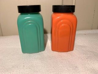 Vtg painted milk glass Salt & Pepper shakers orange & teal with black lids 2