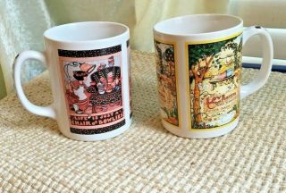 2 Mary Engelbreit Coffee Mugs " Life Is A Chair Of Bowlies " & " Love Comforteth L