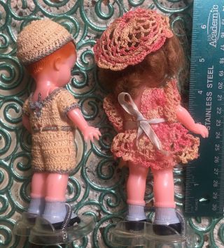 VINTAGE KNICKERBOCKER BOY & GIRL SIDE GLANCE JOINTED ARMS RATTLE DOLLS W Stands 2