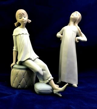 2 Lladro Porcelain Figurines - Girl Tries On Mom 