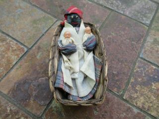 Antique Black Nanny Seed / Fruit Doll In Basket Holding (2) Plastic Babies