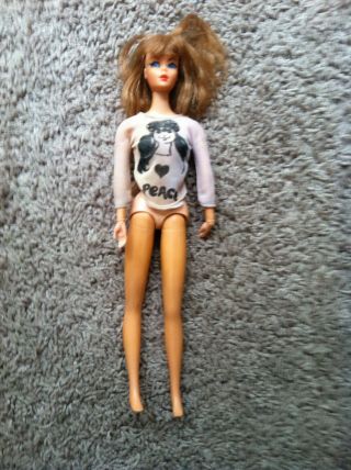 Vintage Barbie With A Peace Shirt On It 1970 