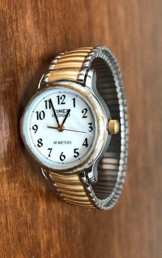 Timex Indiglo Watch Round Face Two Tone Gold Silver Stretch Band Water Resis