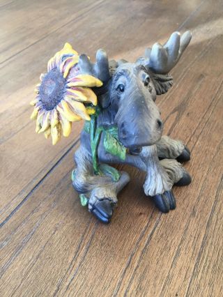 Humor Sitting Brown Wild Moose Figurine With Sunflower