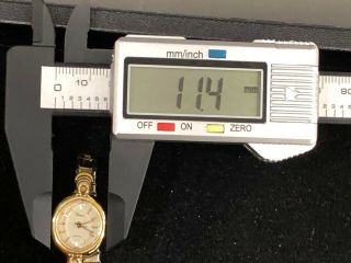 Vintage Ladies Timex Quartz Gold Tone Stretchy Band Watch Battery 3