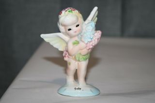 Vintage July Cupid Angel Of The Month Figurine Holding Flower Bouquet
