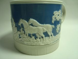 An Antique Relief Moulded Feldspathic Stoneware Hunting Mug,  