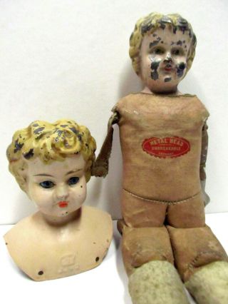 2 Antique Tin Metal Head Dolls - Juno W/ Glass Eyes And " Unbreakable Germany "
