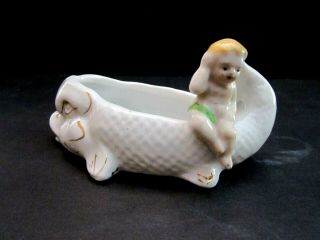 Vintage porcelain baby sitting on a fish dish bowl ashtray mini.  4 1/2 inch. 2
