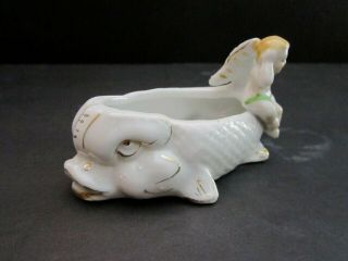 Vintage porcelain baby sitting on a fish dish bowl ashtray mini.  4 1/2 inch. 3