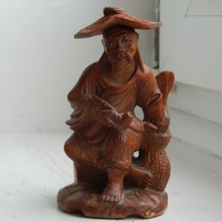 A Very Good Chinese Carved Wooden Figure Of A Pipe Smoker