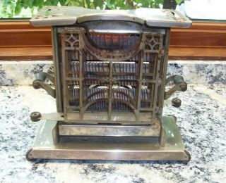 Antique Universal Toaster With Swing Out Arms " It "