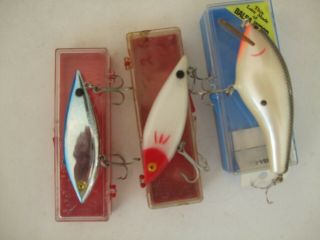 3 Vintage Fishing Lures,  2 Cordell Spot,  1 Silver/blue,  1 Red/white, .  And 1 Balsa