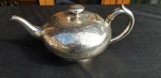 An Antique Silver Plated Tea Pot.  Engraved Patterns By Elkington.  Collectable.