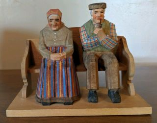 Hand Carved Wood Old Man & Woman On Bench