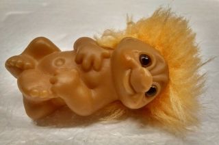 Vintage 1985 Dam Troll Baby W/ Orange Hair Laying Lying Down Plastic Figure Toy