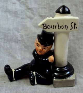 Vtg Salt & Pepper Shaker Set Drunk Man Holding Onto Bourbon St Lamp Post Sign