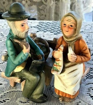 Vintage Elderly Man & Woman On A Bench Figurine European