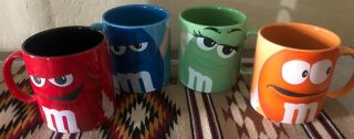 M & M Collectible Mugs/coffee Cups (set Of 4 Blue,  Red,  Green,  And Orange)
